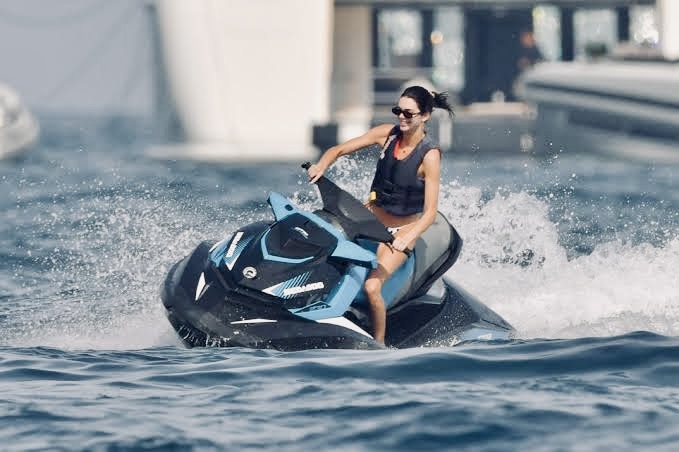 Kendall Jenner's clean, luxurious jet ski look in Monaco with neutral swimwear
